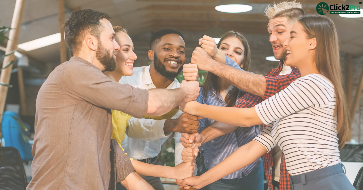 Group supporting each other, symbolizing trust and unity in building healthy relationships with RAD.