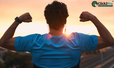 Man celebrating personal growth and empowerment, symbolizing VR therapy for phobias and paranoia.