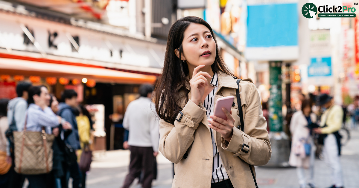 Young woman looking for a premarital counselor near her location on her phone in a busy street.