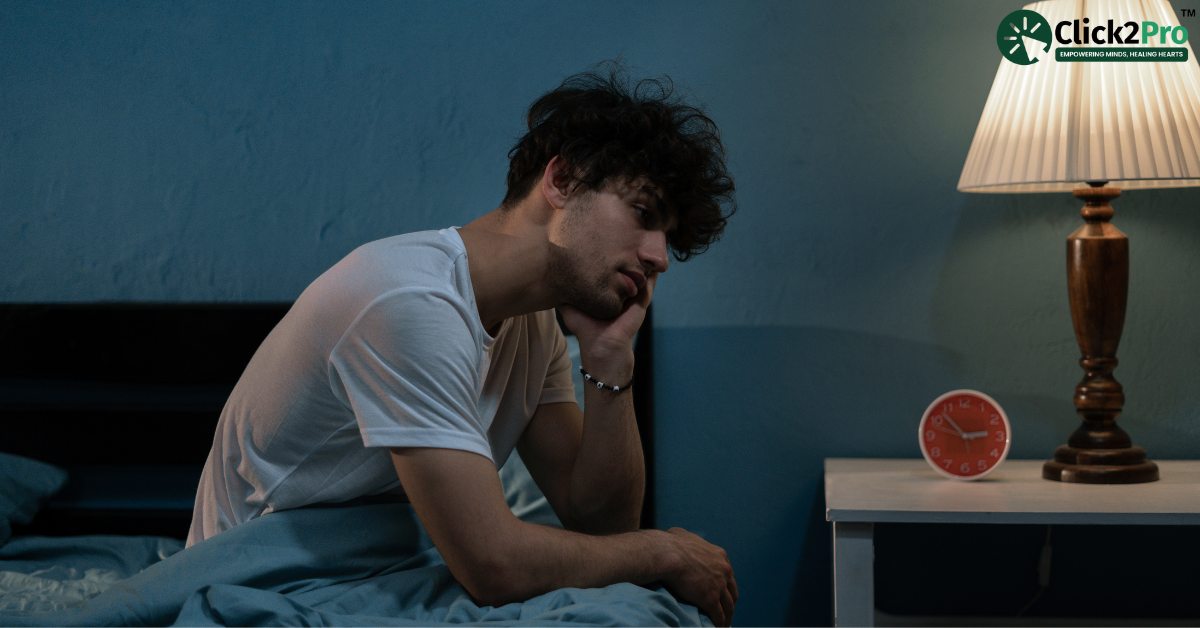 Man struggling with insomnia at night, unable to sleep, representing chronic sleep disorders.