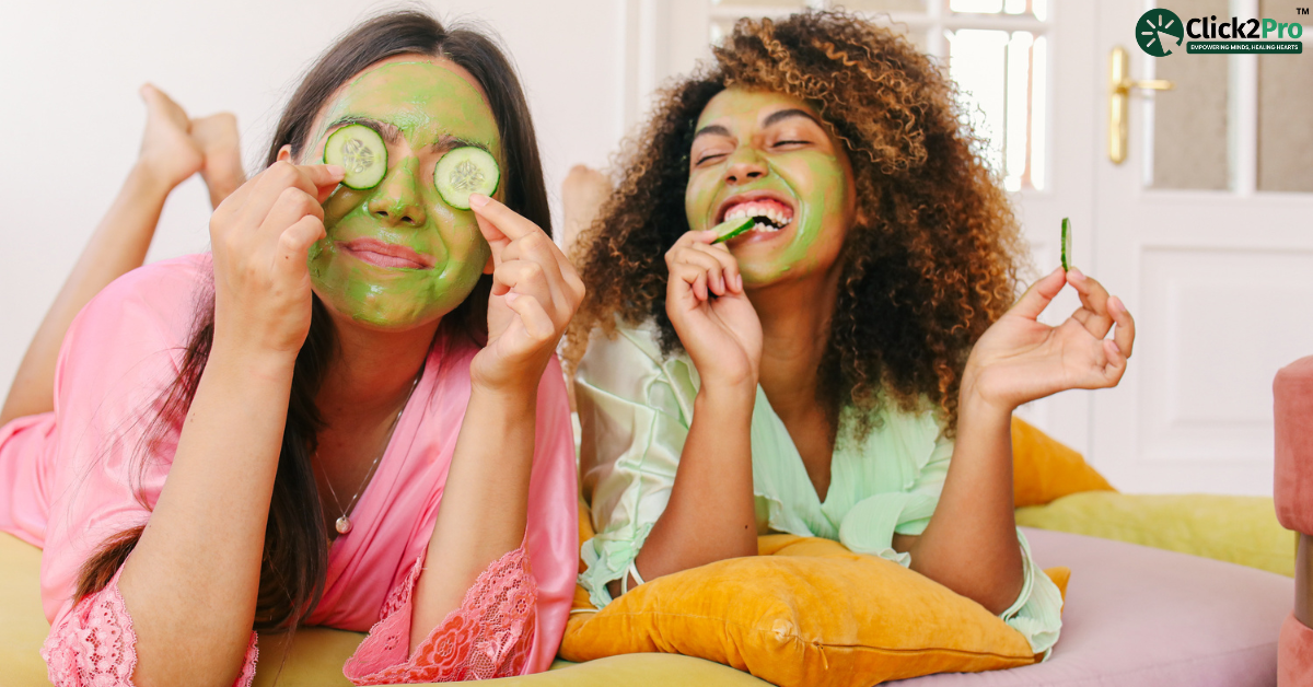 Two women enjoying a self-care day with face masks and cucumbers, promoting wellness and relaxation.