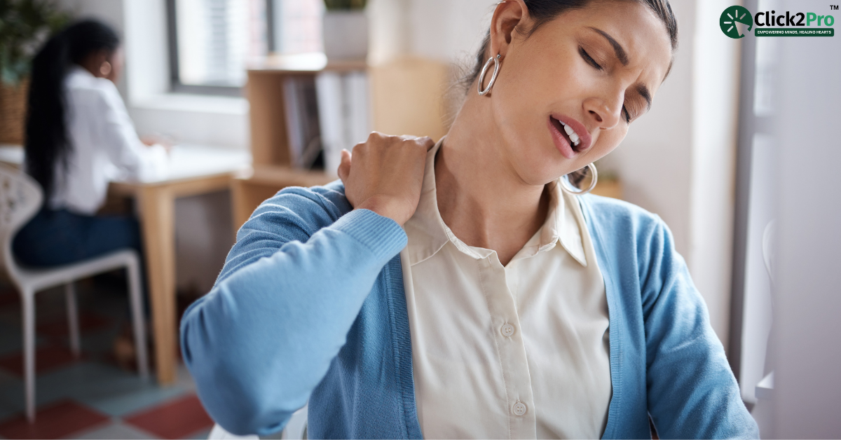 Woman experiencing neck and shoulder pain due to stress, illustrating the physical toll of emotional distress.