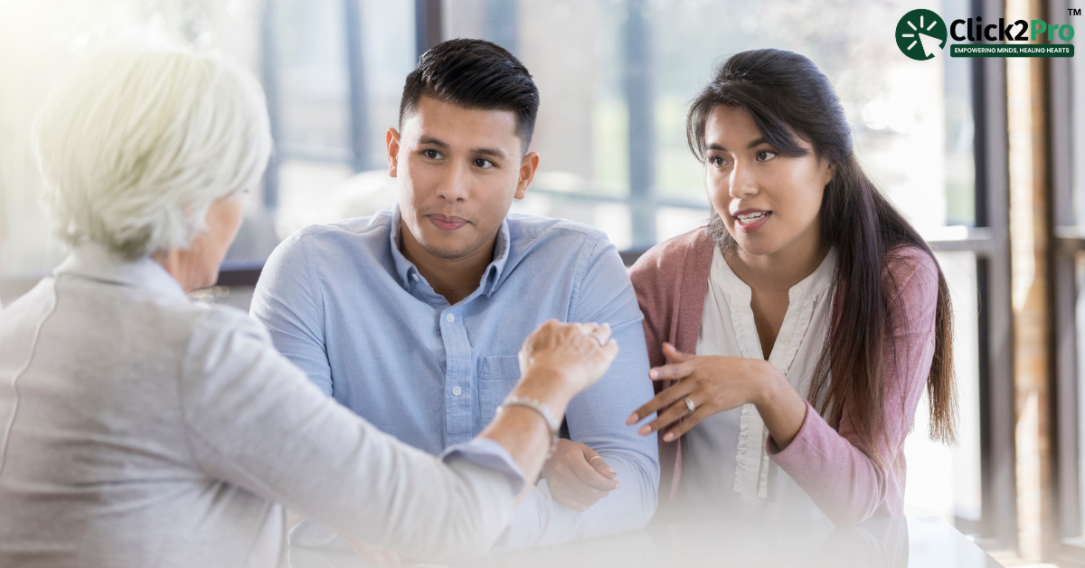 Couple receiving pre-marriage counseling from a therapist, strengthening relationship foundations.