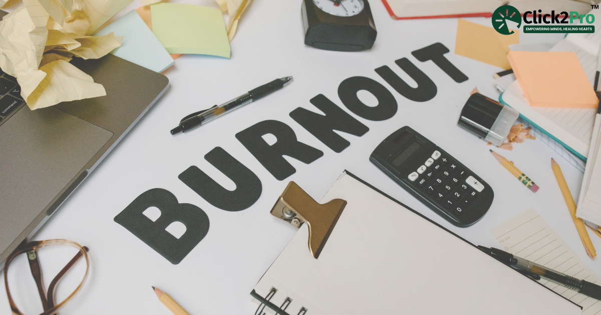 Work burnout concept with cluttered desk, laptop, calculator, and scattered papers.