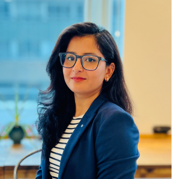 Female psychologist with glasses offering specialized mental health services at Click2Pro