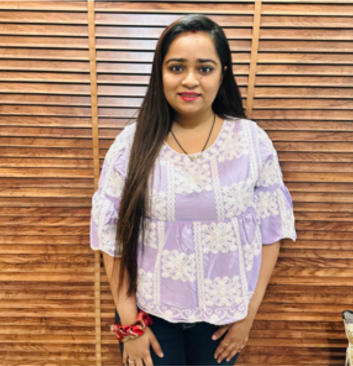 Psychologist in patterned top providing expert counselling services at Click2Pro