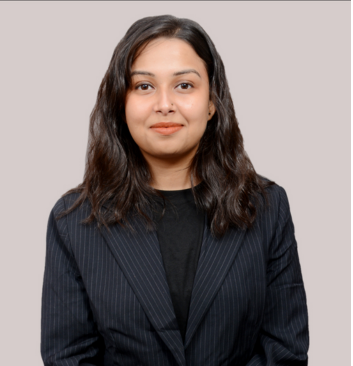 Professional female psychologist in black suit offering expert guidance at Click2Pro