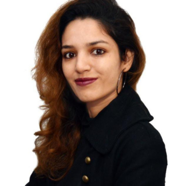 Female psychologist with curly hair offering empathetic mental health support at Click2Pro